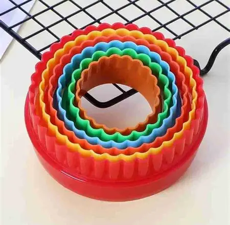 CORTADOR PLASTICO REDONDO BORDE ONDULADO